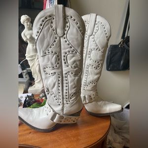 A glamorous studded vintage white cowgirl boot